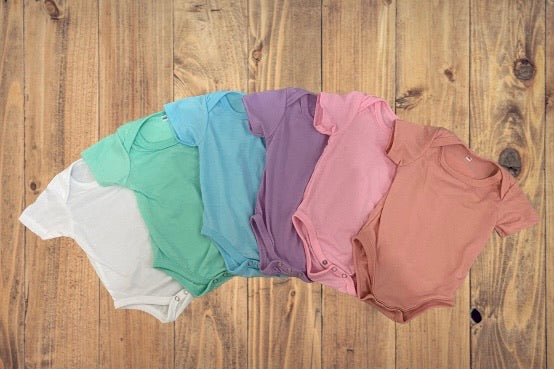 INFANT 100% polyester colored ONESIE short sleeve